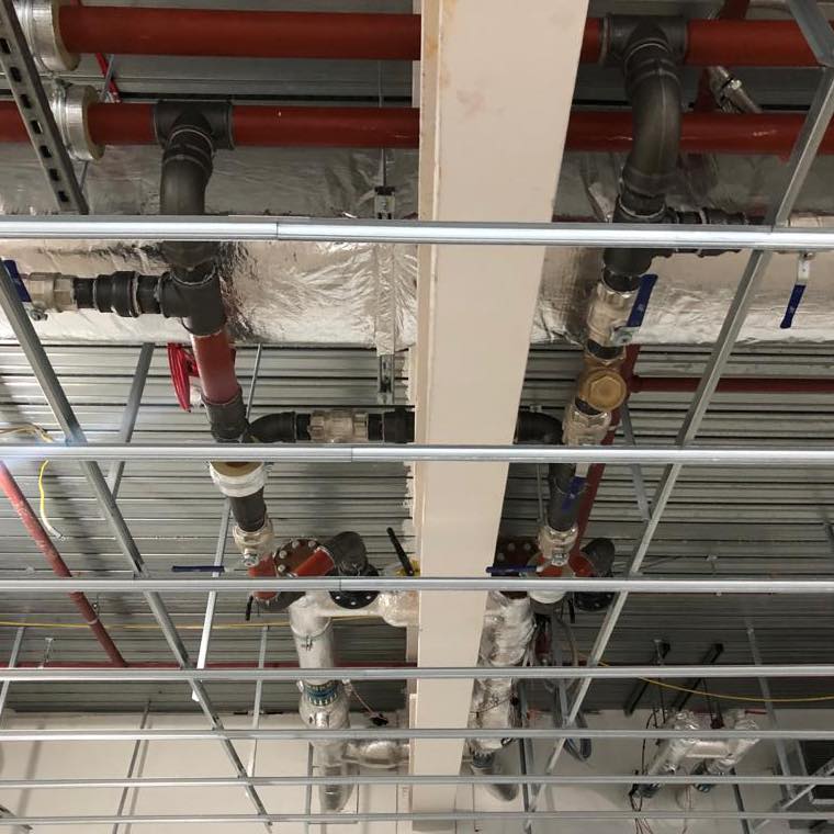 Commercial P&H 2 - Gloucester Plumbing & Heating Man tightening Plumbing